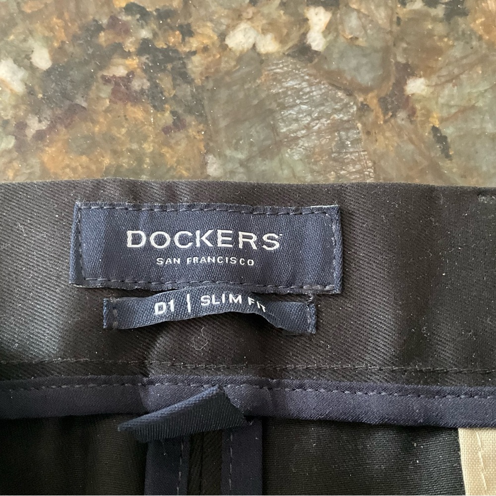 Black Docker’s cotton pants.